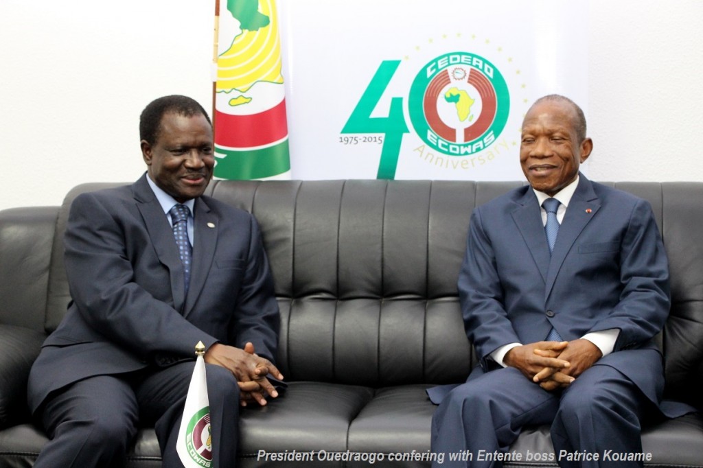 President Ouedraogo confering with Entente boss Patrice Kouame