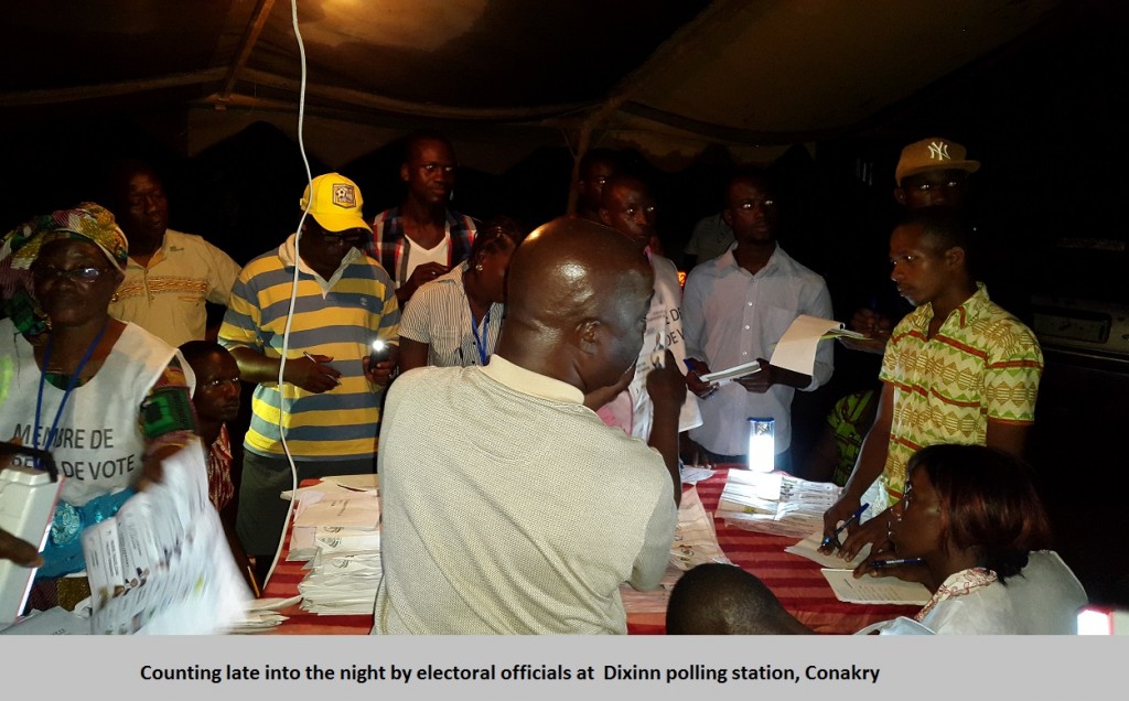 Counting late into the night by electoral officials at  Dixinn polling station, Conakry