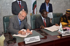 USAID West Africa Director with Ecowas President Signing the agreement